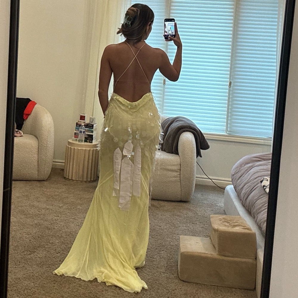 Yellow sequin rat and boa dress